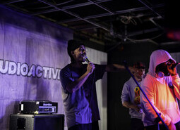 Jordan Stephens performs in Worthing while reuniting with CEO of Audio Active, Adam Joolia