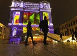 The unveiling of a specially commissioned AI artwork from Ouchhh Studio, made using cognitive technology to visualise brainwaves of the Arts & Film ‘Game Changers’ and projected across the façade of the V&A’s Exhibition Road Courtyard building in London, as part of The National Lottery’s 30th birthday celebrations. 