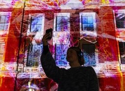 The unveiling of a specially commissioned AI artwork from Ouchhh Studio, made using cognitive technology to visualise brainwaves of the Arts & Film ‘Game Changers’ and projected across the façade of the V&A’s Exhibition Road Courtyard building in London, as part of The National Lottery’s 30th birthday celebrations. 