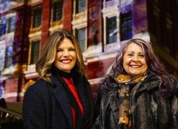 left-right Nikki Stratton and Marilyn Willrich attend the unveiling of a specially commissioned AI artwork from Ouchhh Studio, made using cognitive technology to visualise brainwaves of the Arts & Film ‘Game Changers’ and projected across the façade of the V&A’s Exhibition Road Courtyard building in London, as part of The National Lottery’s 30th birthday celebrations. 