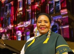 Nandi Jola attends the unveiling of a specially commissioned AI artwork from Ouchhh Studio, made using cognitive technology to visualise brainwaves of the Arts & Film ‘Game Changers’ and projected across the façade of the V&A’s Exhibition Road Courtyard building in London, as part of The National Lottery’s 30th birthday celebrations.