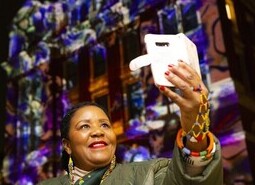 Nandi Jola attends the unveiling of a specially commissioned AI artwork from Ouchhh Studio, made using cognitive technology to visualise brainwaves of the Arts & Film ‘Game Changers’ and projected across the façade of the V&A’s Exhibition Road Courtyard building in London, as part of The National Lottery’s 30th birthday celebrations.