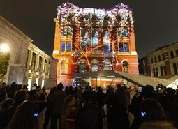 The unveiling of a specially commissioned AI artwork from Ouchhh Studio, made using cognitive technology to visualise brainwaves of the Arts & Film ‘Game Changers’ and projected across the façade of the V&A’s Exhibition Road Courtyard building in London, as part of The National Lottery’s 30th birthday celebrations. 