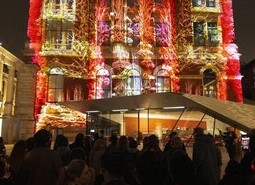 The unveiling of a specially commissioned AI artwork from Ouchhh Studio, made using cognitive technology to visualise brainwaves of the Arts & Film ‘Game Changers’ and projected across the façade of the V&A’s Exhibition Road Courtyard building in London, as part of The National Lottery’s 30th birthday celebrations.