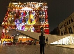 The unveiling of a specially commissioned AI artwork from Ouchhh Studio, made using cognitive technology to visualise brainwaves of the Arts & Film ‘Game Changers’ and projected across the façade of the V&A’s Exhibition Road Courtyard building in London, as part of The National Lottery’s 30th birthday celebrations. 