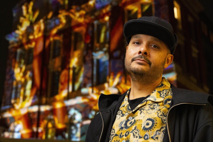 Adam Joolia attends the unveiling of a specially commissioned AI artwork from Ouchhh Studio, made using cognitive technology to visualise brainwaves of the Arts & Film ‘Game Changers’ and projected across the façade of the V&A’s Exhibition Road Courtyard building in London, as part of The National Lottery’s 30th birthday celebrations. 