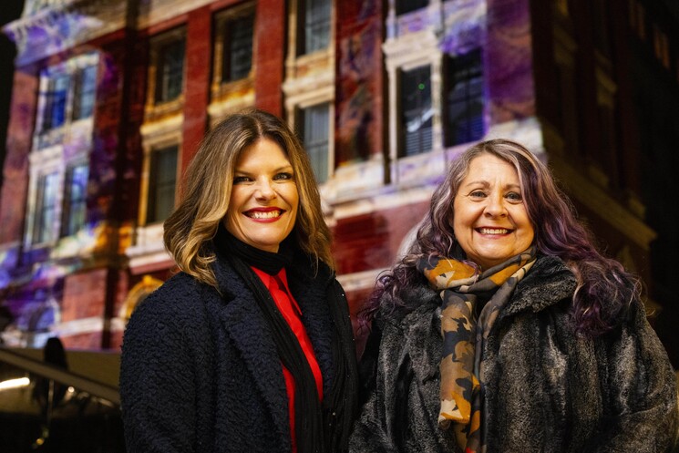 left-right Nikki Stratton and Marilyn Willrich attend the unveiling of a specially commissioned AI artwork from Ouchhh Studio, made using cognitive technology to visualise brainwaves of the Arts & Film ‘Game Changers’ and projected across the façade of the V&A’s Exhibition Road Courtyard building in London, as part of The National Lottery’s 30th birthday celebrations. 