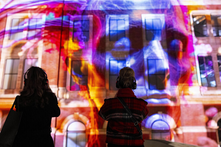 The unveiling of a specially commissioned AI artwork from Ouchhh Studio, made using cognitive technology to visualise brainwaves of the Arts & Film ‘Game Changers’ and projected across the façade of the V&A’s Exhibition Road Courtyard building in London, as part of The National Lottery’s 30th birthday celebrations.