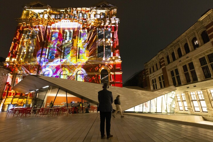 The unveiling of a specially commissioned AI artwork from Ouchhh Studio, made using cognitive technology to visualise brainwaves of the Arts & Film ‘Game Changers’ and projected across the façade of the V&A’s Exhibition Road Courtyard building in London, as part of The National Lottery’s 30th birthday celebrations. 